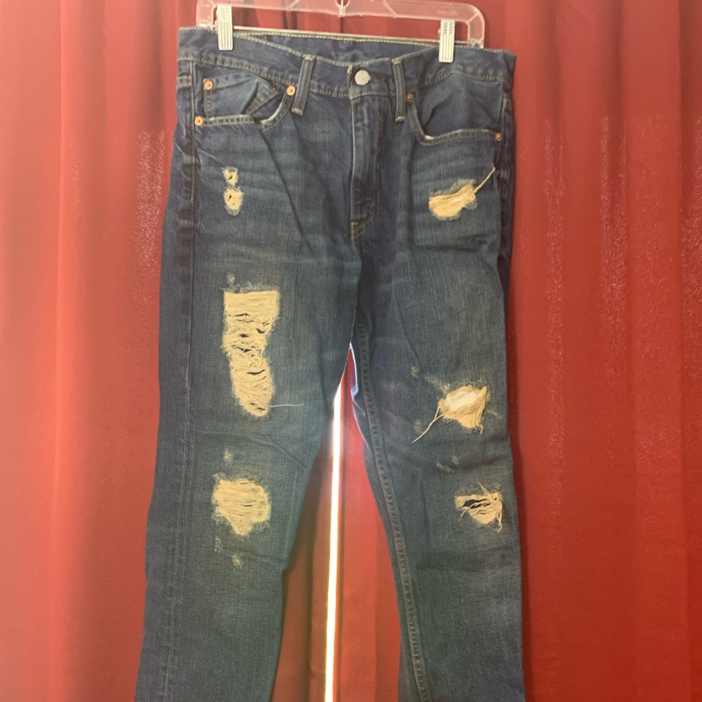ripped levi 511s